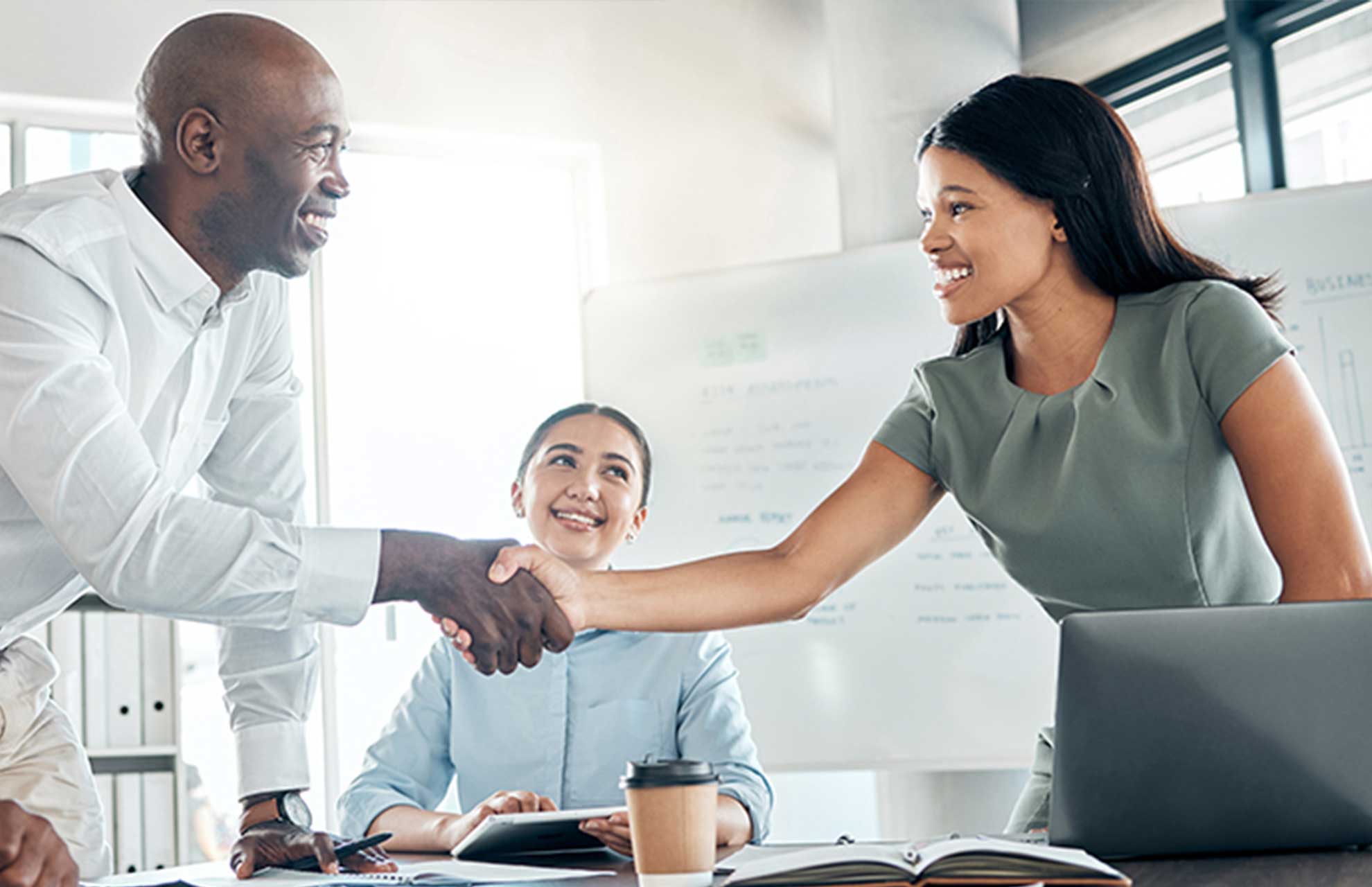 Business professionals meeting in Kigali — Rwanda's open visa policy and straightforward work permit process make it easy for foreign entrepreneurs to establish and operate here