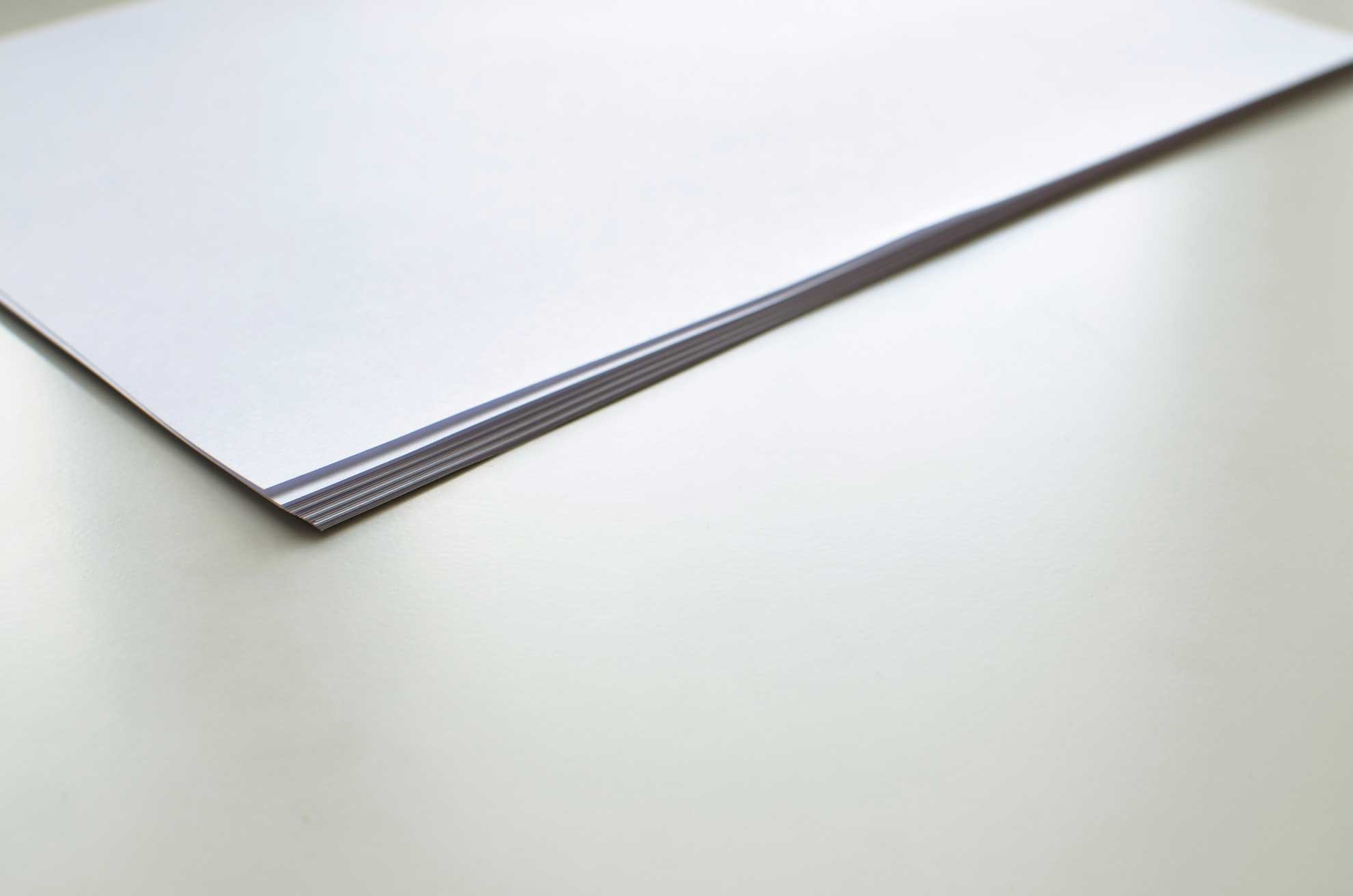 Papers on an office table representing transfer pricing documentation such as Master File Local File and intercompany agreements