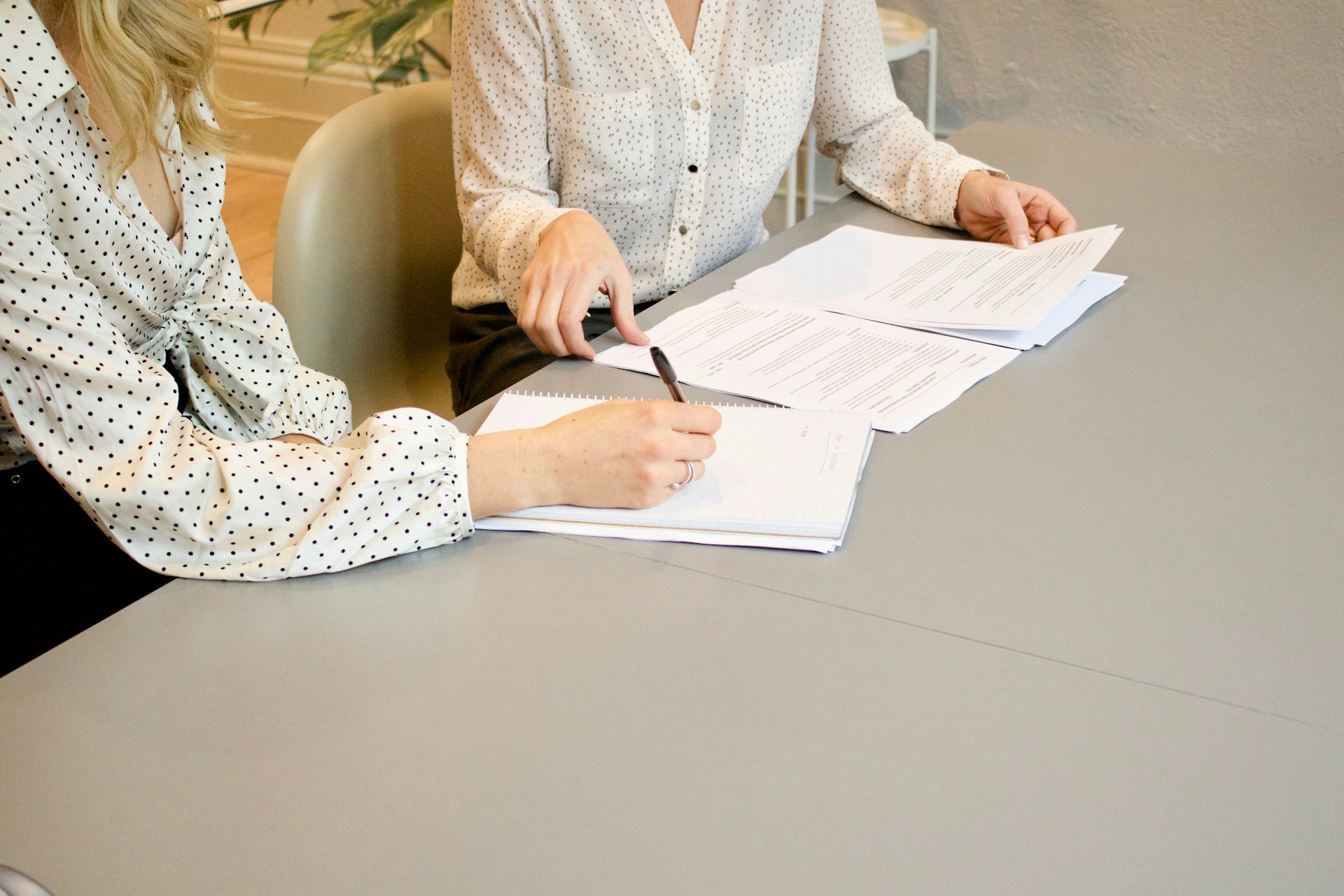 Lawyer reviewing a trust deed document — the legal instrument that governs how a private trust holds and distributes assets for beneficiaries